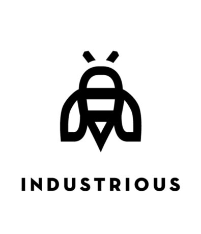 A minimalist black geometric bee icon is centered above the word INDUSTRIOUS in bold, uppercase letters on a white background, inspired by the Membership Benefits at Seattle Bouldering Project.