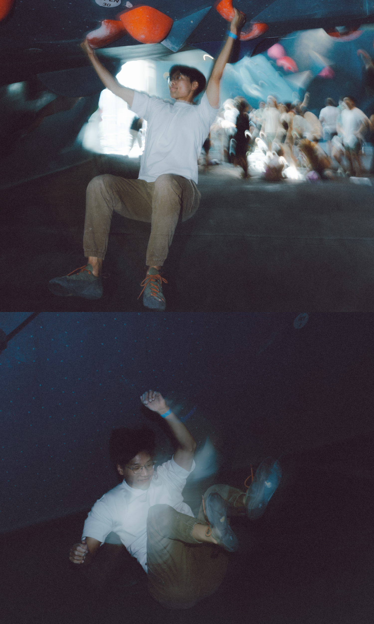 A person in a white t-shirt and beige pants climbs indoor bouldering holds in a dimly lit gym, with a blurry crowd in the background; the lower half shows the person falling from the climbing wall.
